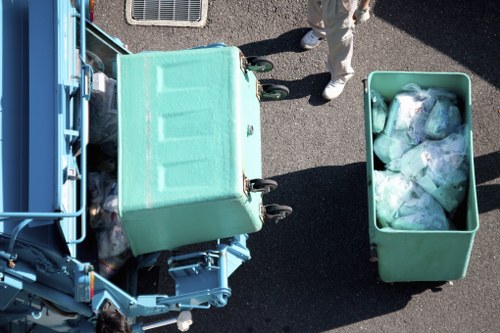 Man and van departing after completing a commercial rubbish collection in Shoreditch